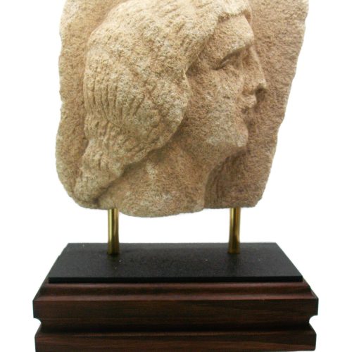 Cypriot Limestone Relief of a Womans Head